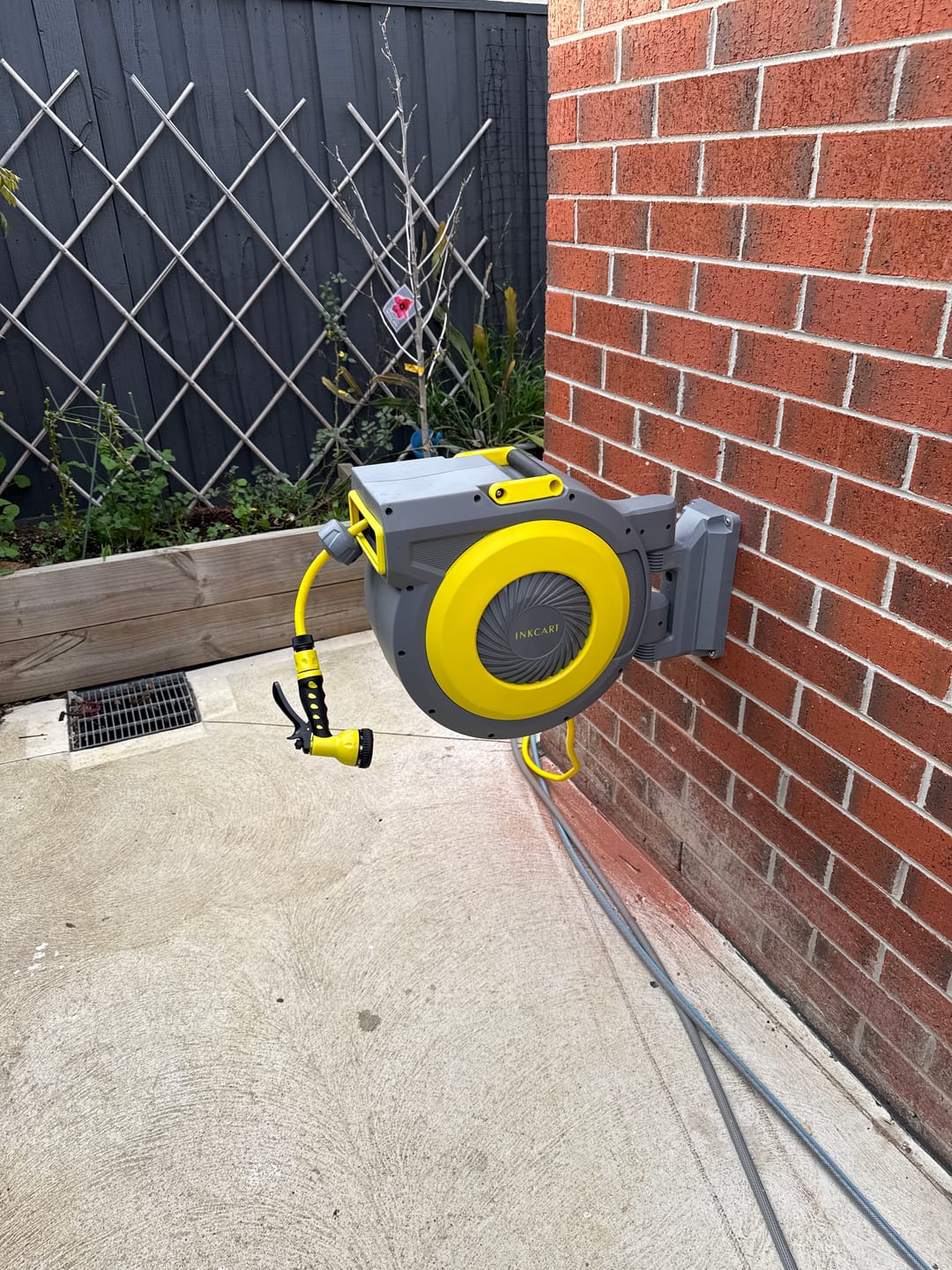 Customer photo review of 30m Retractable Garden Hose Reel.. Fully Installed
