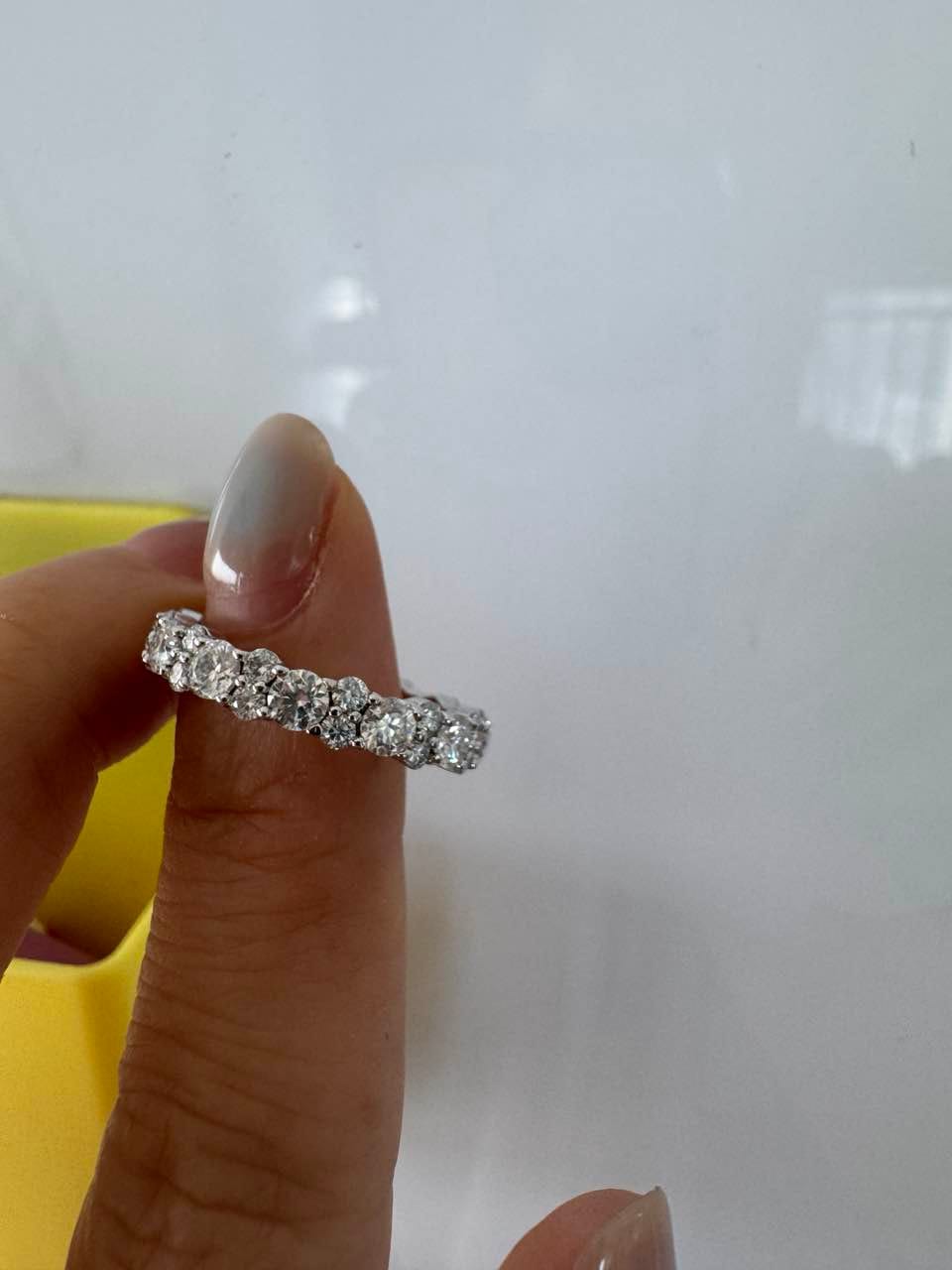 Customer photo review of S925 Moissanite 2.5 Ct Round Cut Full White/Green Stone Wedding Band for Women