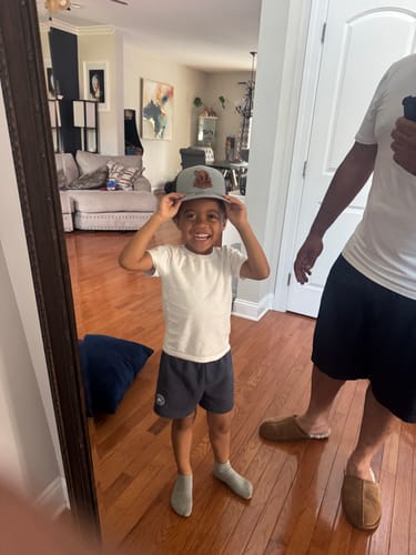 Customer photo review of Custom Leather Patch Trucker Hat - Richardson 112