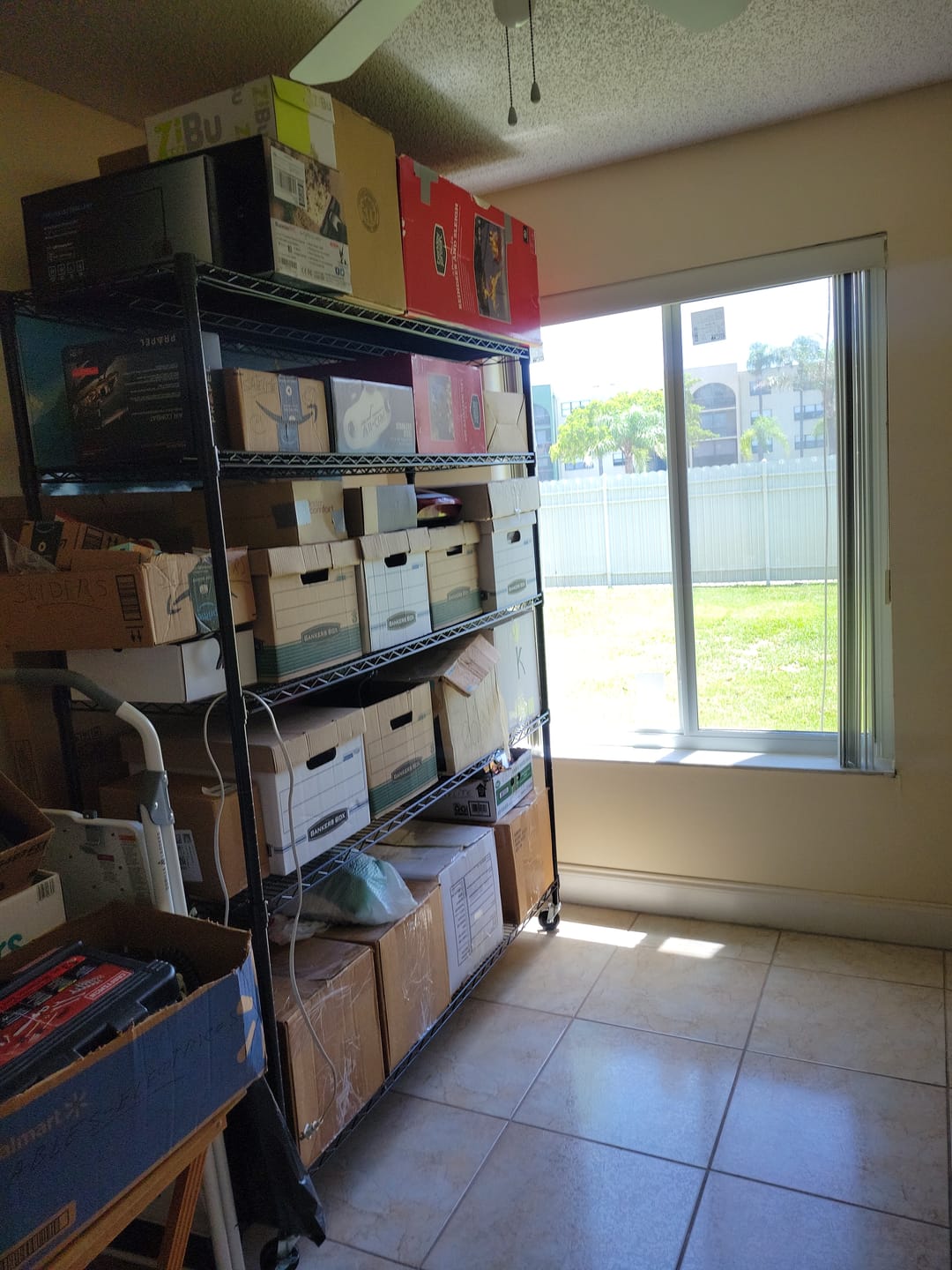 Customer photo review of Reibii 60" W x 73" H Wire Storage Shelves on Wheels, 5-Shelf Adjustable, 3200lbs Heavy Duty Metal Shelving for Garage Kitchen Pantry