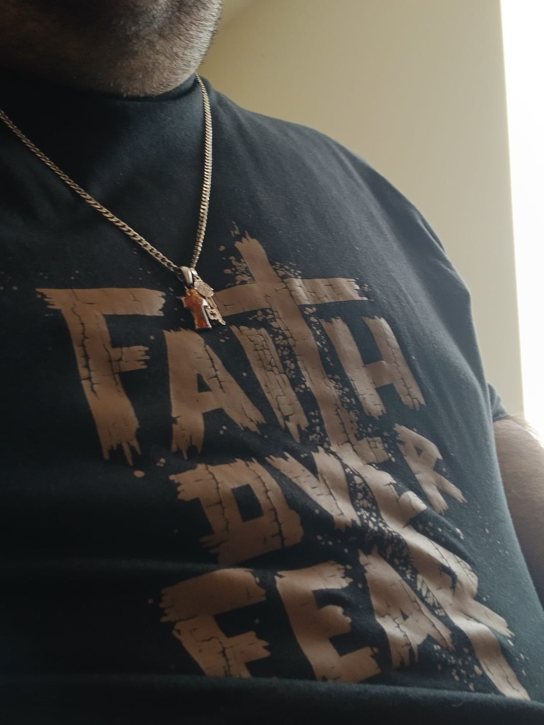 Customer photo review of Faith Over Fear Tee