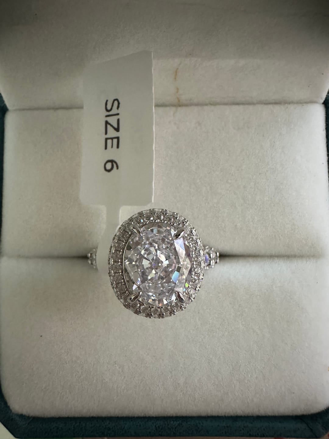 Customer photo review of Gorgeous Hidden Halo Oval Cut 4.0ct Engagement Ring In Sterling Silver