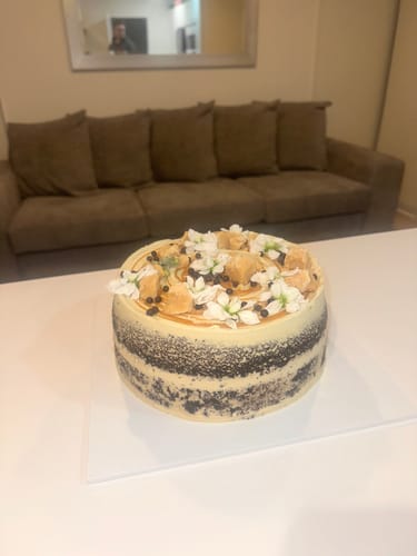 Customer photo review of chocolate caramel cake