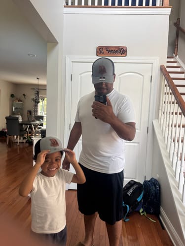Customer photo review of Custom Leather Patch Trucker Hat - Richardson 112