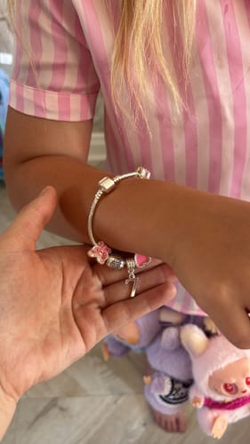 Customer photo review of Childrens Pink 'Happy 7th Birthday' Silver Plated Charm Bead Bracelet