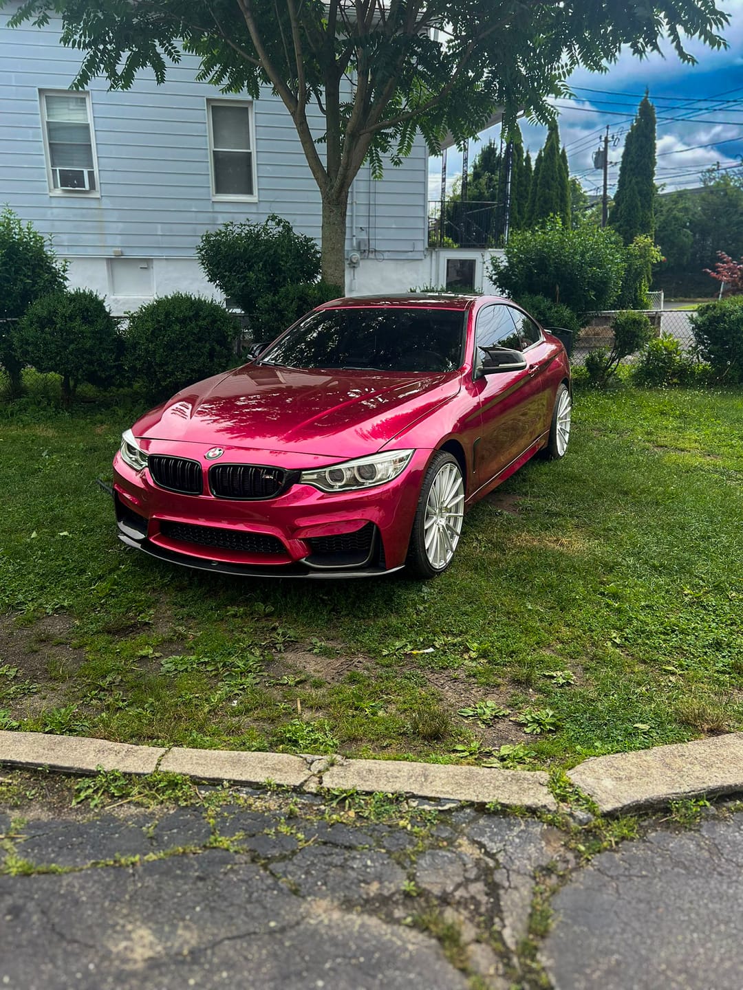 Customer photo review of Glossy Metallic Rubellite Purple Vinyl Wrap