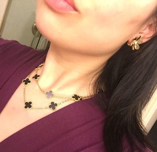 Customer photo review of FRIVOLE GOLD FLOWER EARRINGS