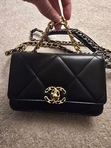 Customer photo review of 19 WOC 19CM BLACK LAMBSKIN GOLD HARDWARE