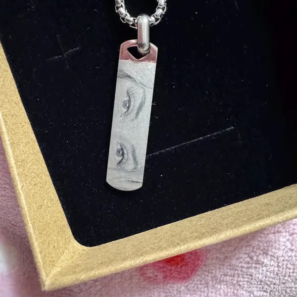Customer photo review of Custom Engraved Eyes Necklace