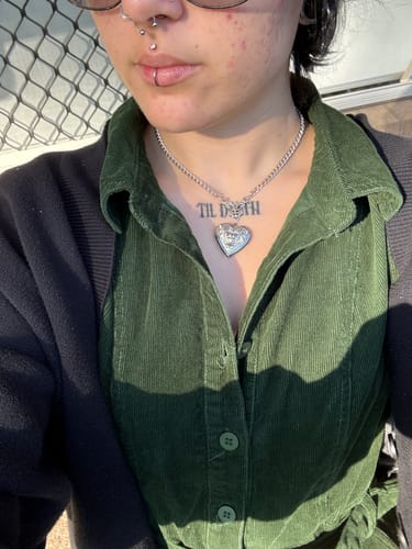 Customer photo review of Bat Locket Necklace