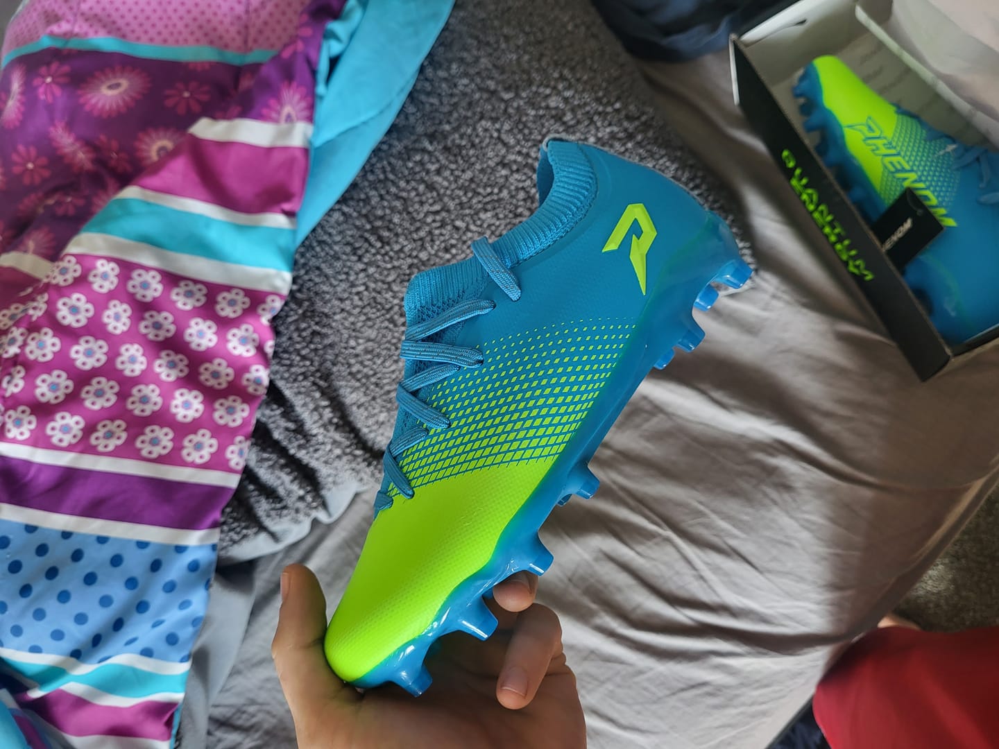 Customer photo review of Quantum Energy: All Purpose Cleats - Columbia Blue & Slime