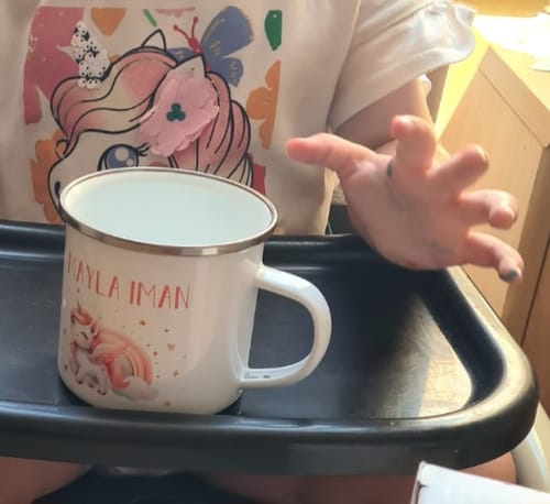 Customer photo review of Enamel mug for children – personalized mug with name – gift for Easter, school enrollment and birthday – children's mug - Motiv: Einhorn, Personalization: Mayla Iman, Schrift wie Max regenbogen