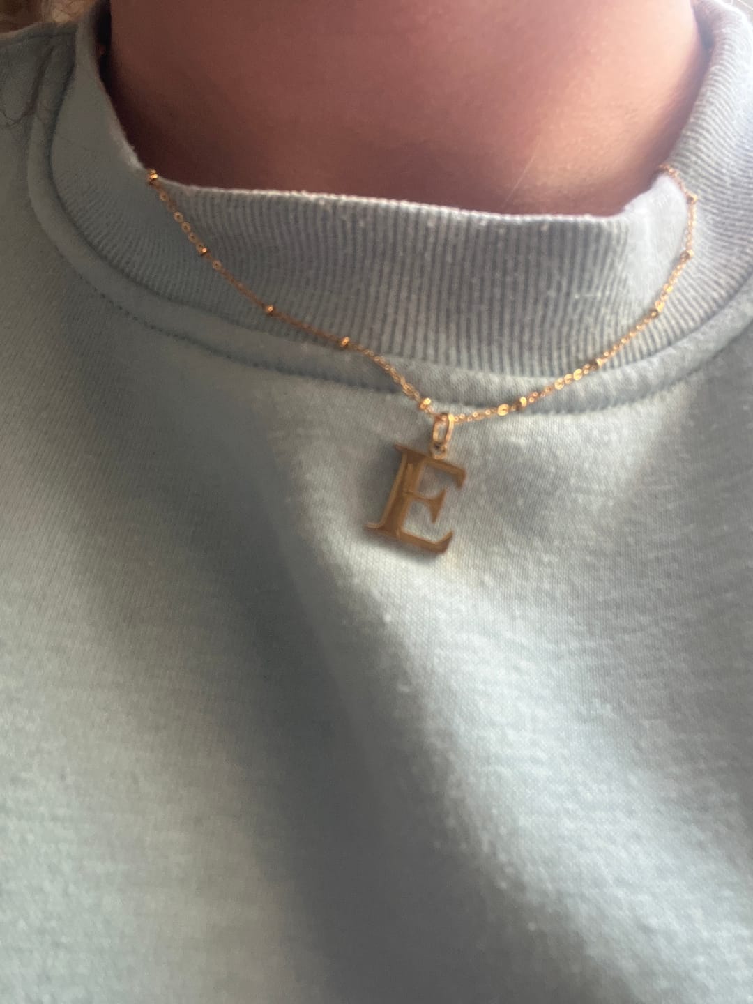 Customer photo review of E Initial Pendant Necklace In Gold