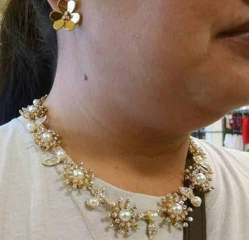 Customer photo review of FRIVOLE GOLD FLOWER EARRINGS