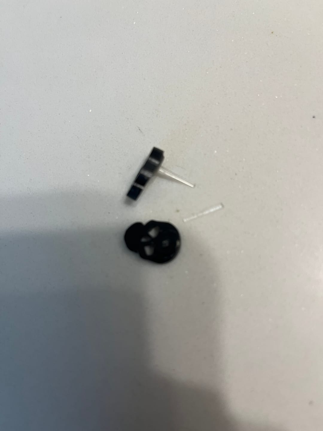 Customer photo review of Skull Studs Hypoallergenic Earrings for Sensitive Ears Made with Plastic Posts