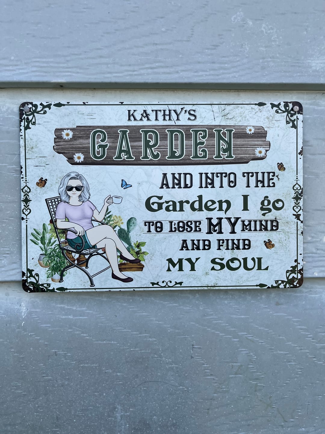 Customer photo review of And Into The Garden I Go Gardening Girl - Garden Sign - Personalized Custom Classic Metal Signs - Gift For Gardeners