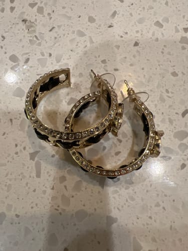 Customer photo review of DOUBLE C GOLD LEATHER CURVED HOOK STUD EARRINGS