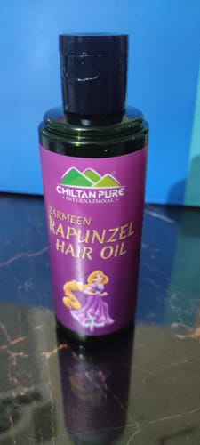 Customer photo review of Rapunzel Hair Oil - Combinations of Different Herbal Oils, Prevents From Dandruff Hair Fall, Improves Hair Growth & Promotes Shiny, Strong Hair,,♀️👩 Women's First Choice