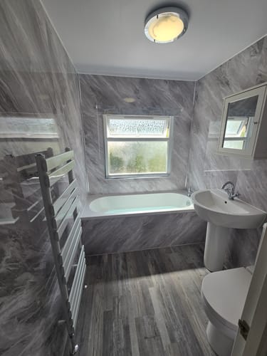 Customer photo review of Premium Grey Stone Marble Gloss Shower Wall Panel - 1M x 2.4M