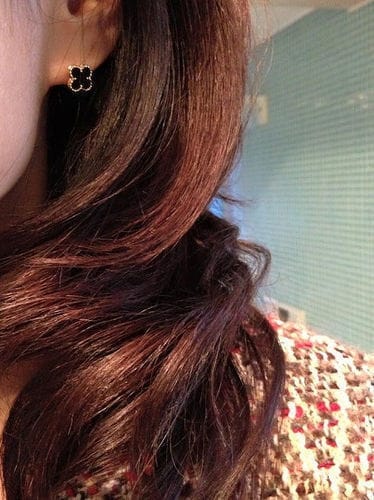 Customer photo review of CLOVER MEDIUM GOLD ONYX STUD EARRINGS