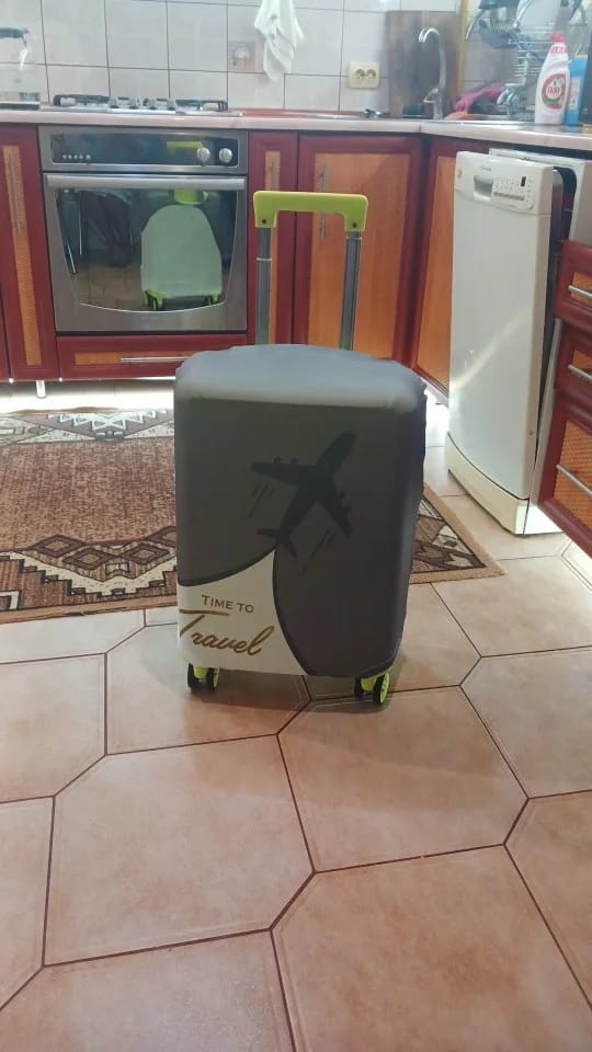 Customer photo review of Housse de Valise <br>Time To Travel