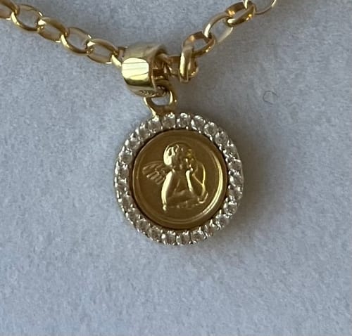 Customer photo review of Guardian Angel Cubic Zirconia Pendant in 9ct Yellow Gold