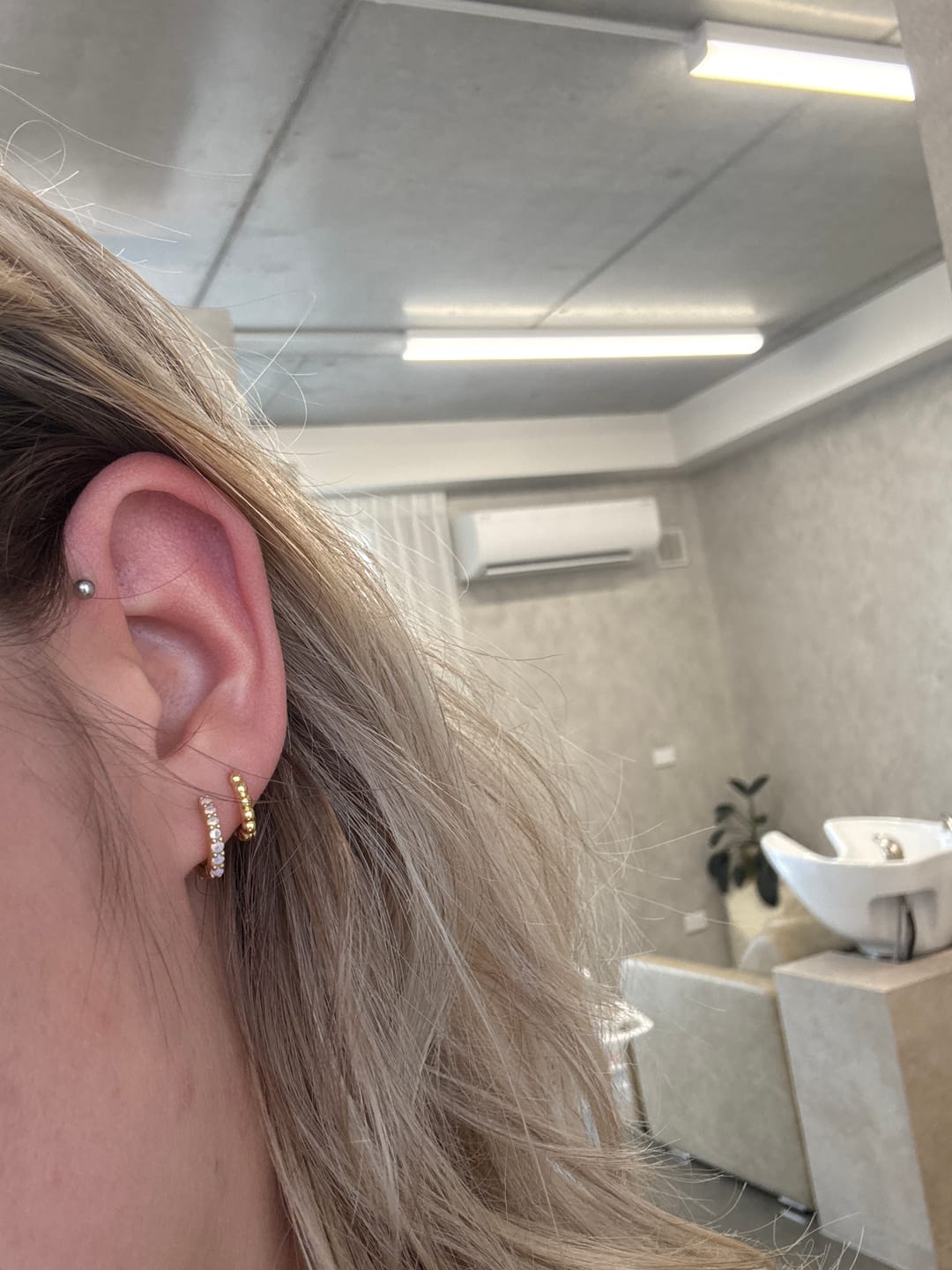 Customer photo review of Ball Hoop Huggie Earrings