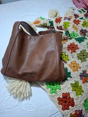 Reseña con foto de un cliente sobre Cartera Tote Basic