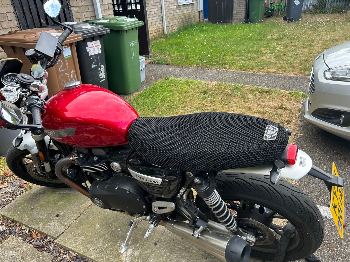 Wind Rider mesh seat cover installed on a Triumph Speed Twin