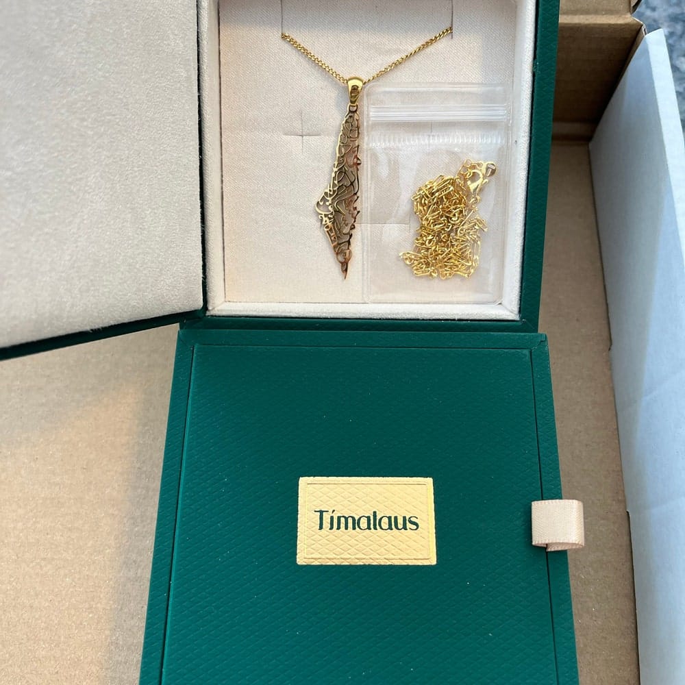 Customer photo review of Palestine Calligraphy Map Necklace