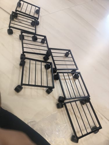 Customer photo review of United Crafts Rozy Wheel Pot Stands for Planters