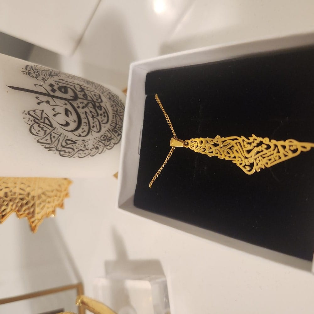 Customer photo review of Palestine Calligraphy Map Necklace
