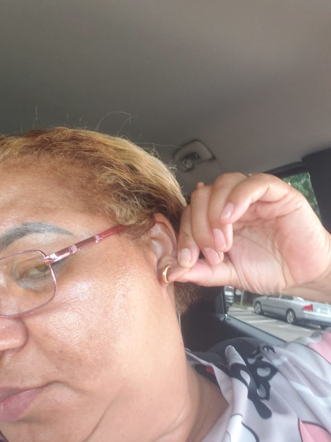 Customer photo review of Minimal Huggie Earrings