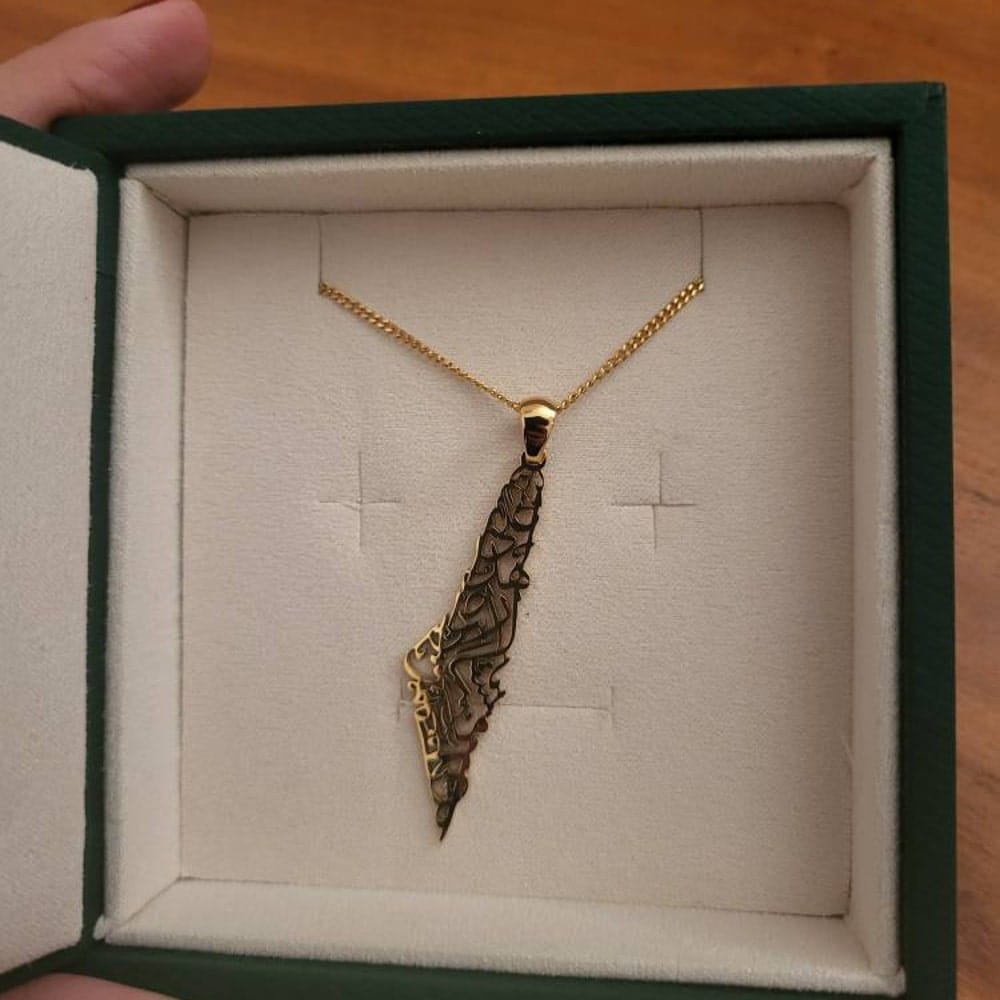 Customer photo review of Palestine Calligraphy Map Necklace