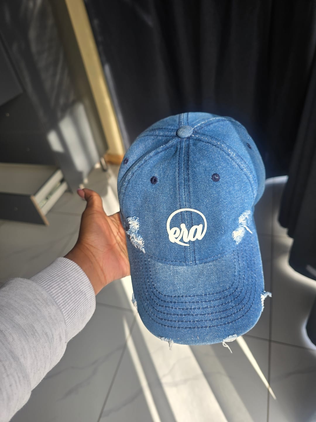 Customer photo review of Era Distressed Denim Cap