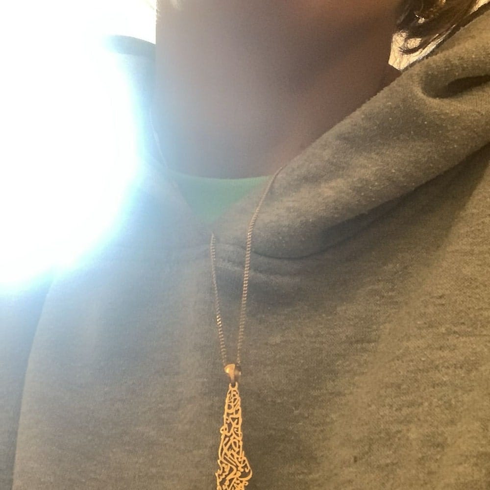 Customer photo review of Palestine Calligraphy Map Necklace