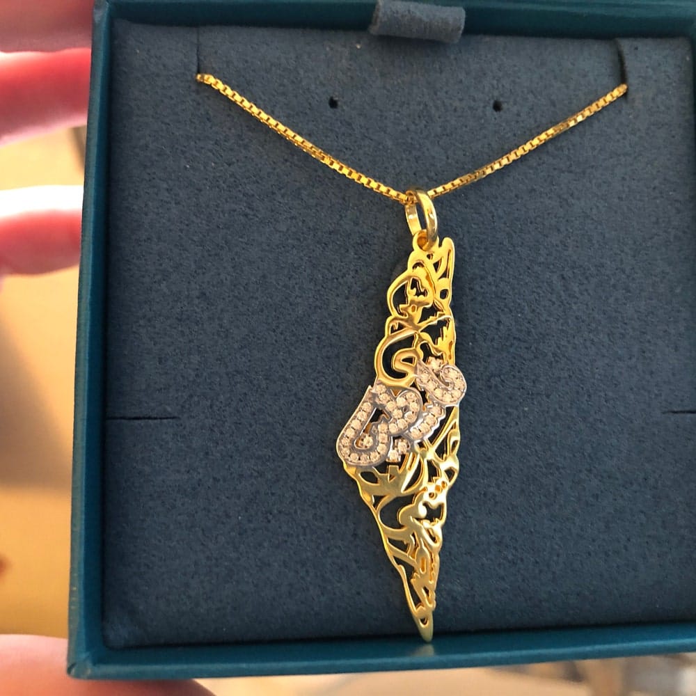 Customer photo review of Palestine Calligraphy Map Necklace