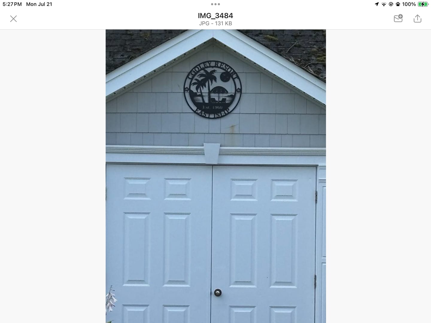Customer photo review of Beach Palm Metal Sign