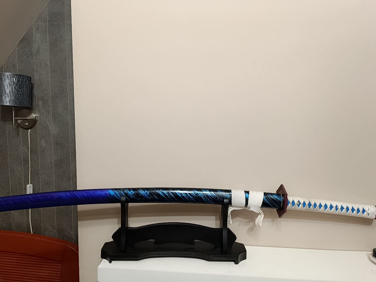 Customer photo review of The Giyuu Tomioka Handmade Katana Clay Tempered T10 Steel From Demon Slayer