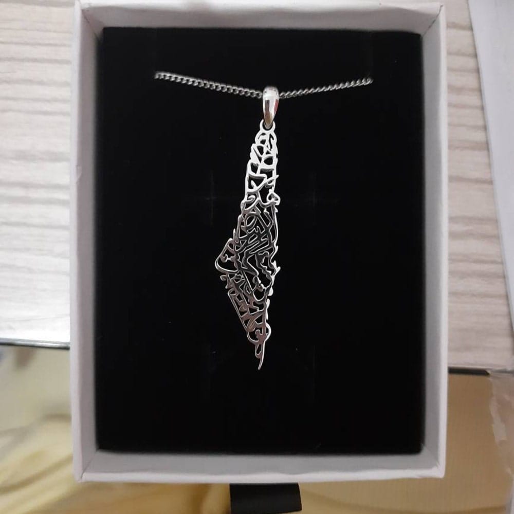 Customer photo review of Palestine Calligraphy Map Necklace