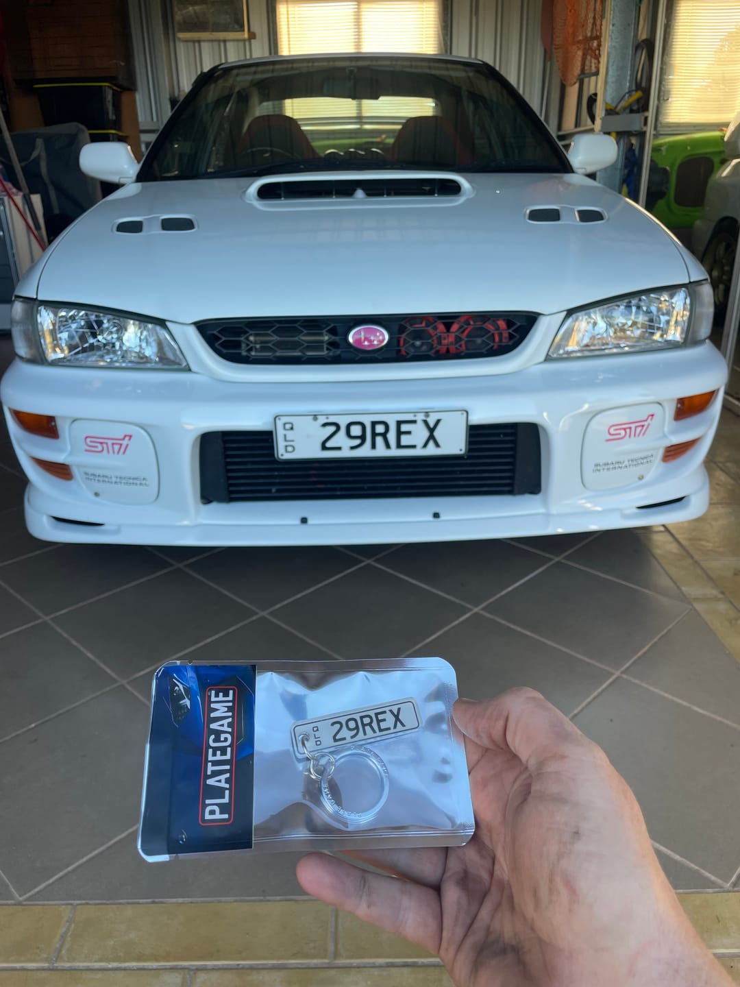 Customer photo review of QLD Classic Licence Plate Custom Keychain