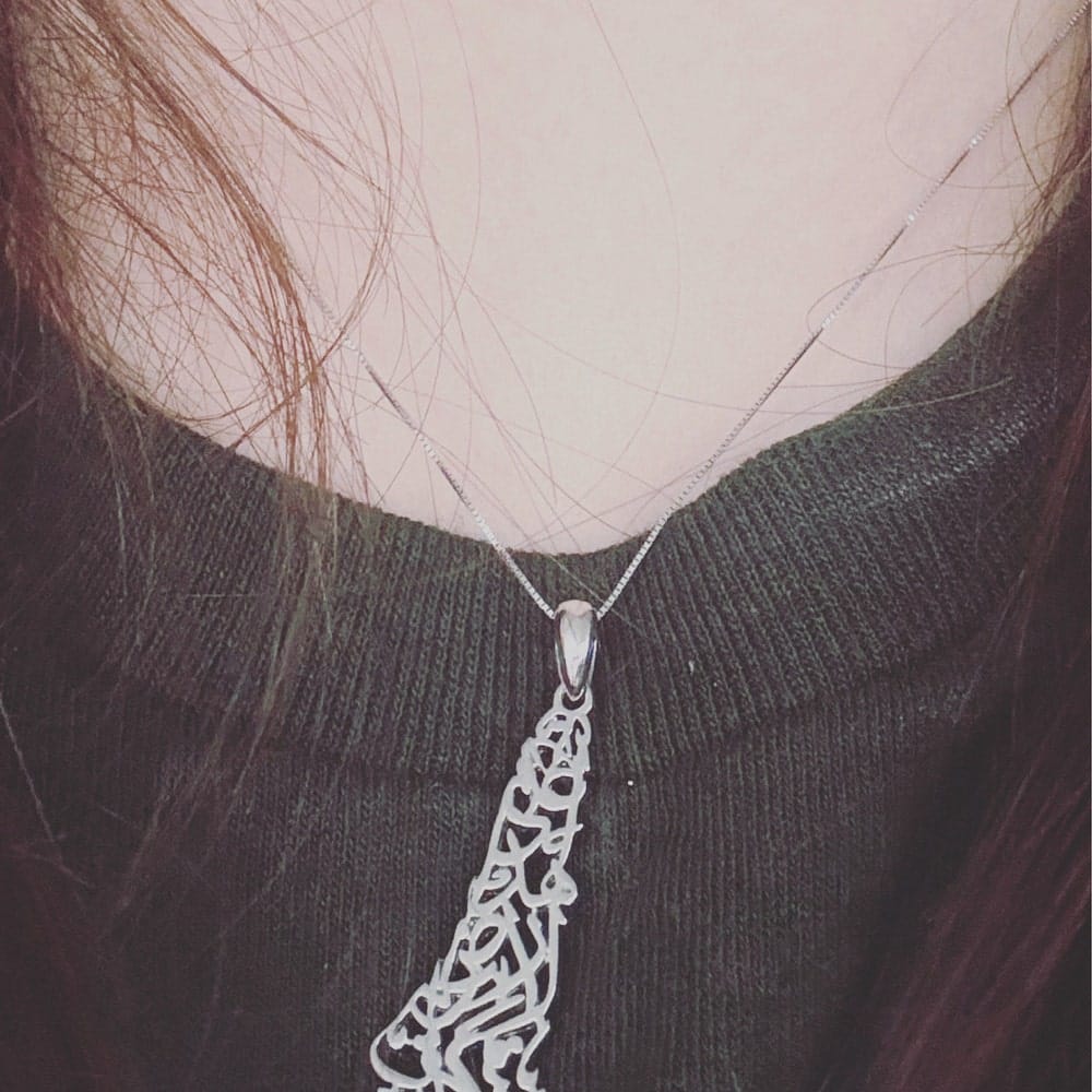 Customer photo review of Palestine Calligraphy Map Necklace