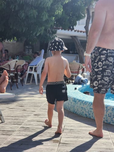 Customer photo review of Hybrid Swim Trunks in Off The Wall