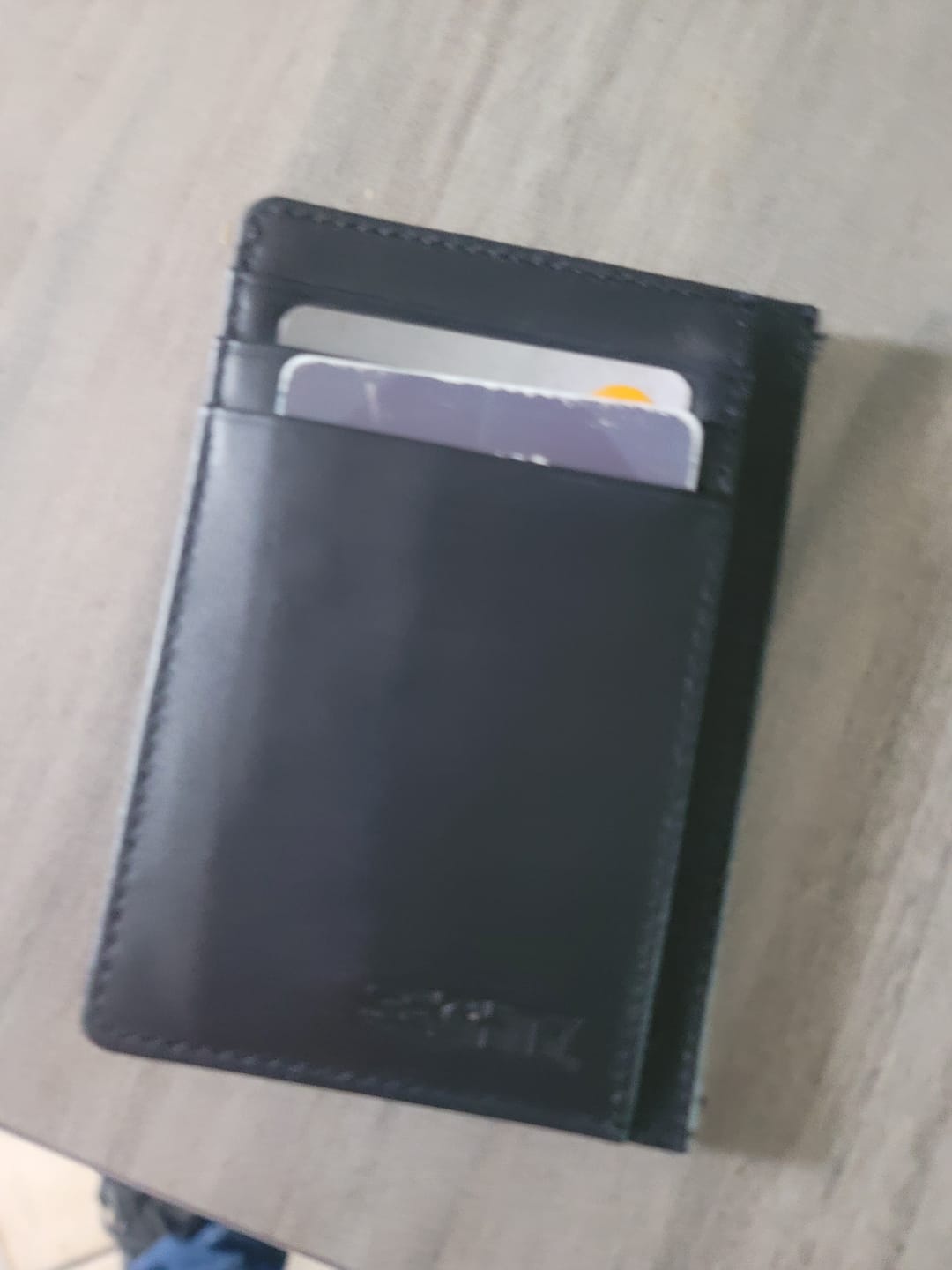 Customer photo review of 80Eighty® Black Leather Wallet