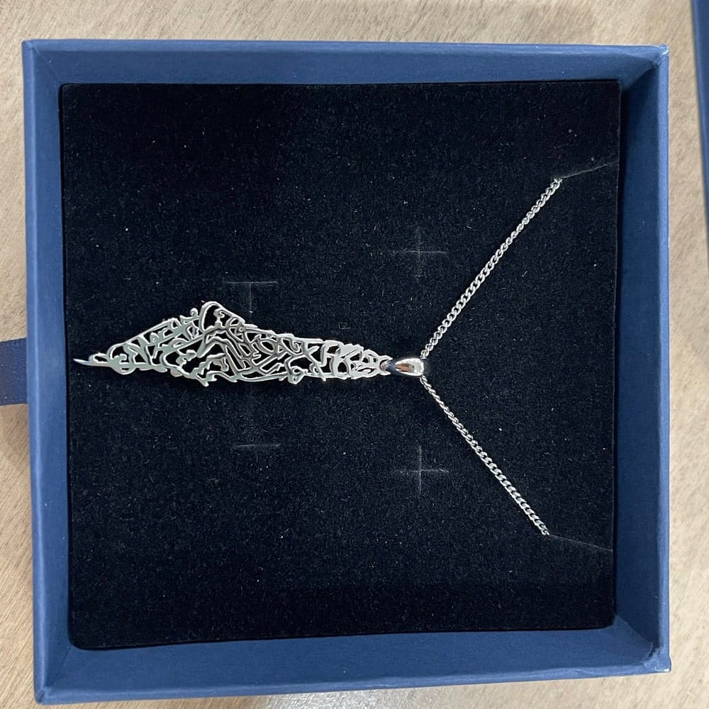 Customer photo review of Palestine Calligraphy Map Necklace