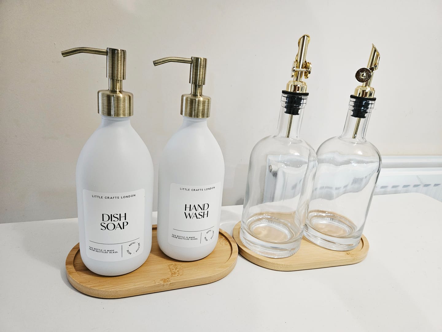 Customer photo review of Set of 2 Milky White Glass Bottle 500 ML with Stainless Steel Pump & Small Tray (White Label)