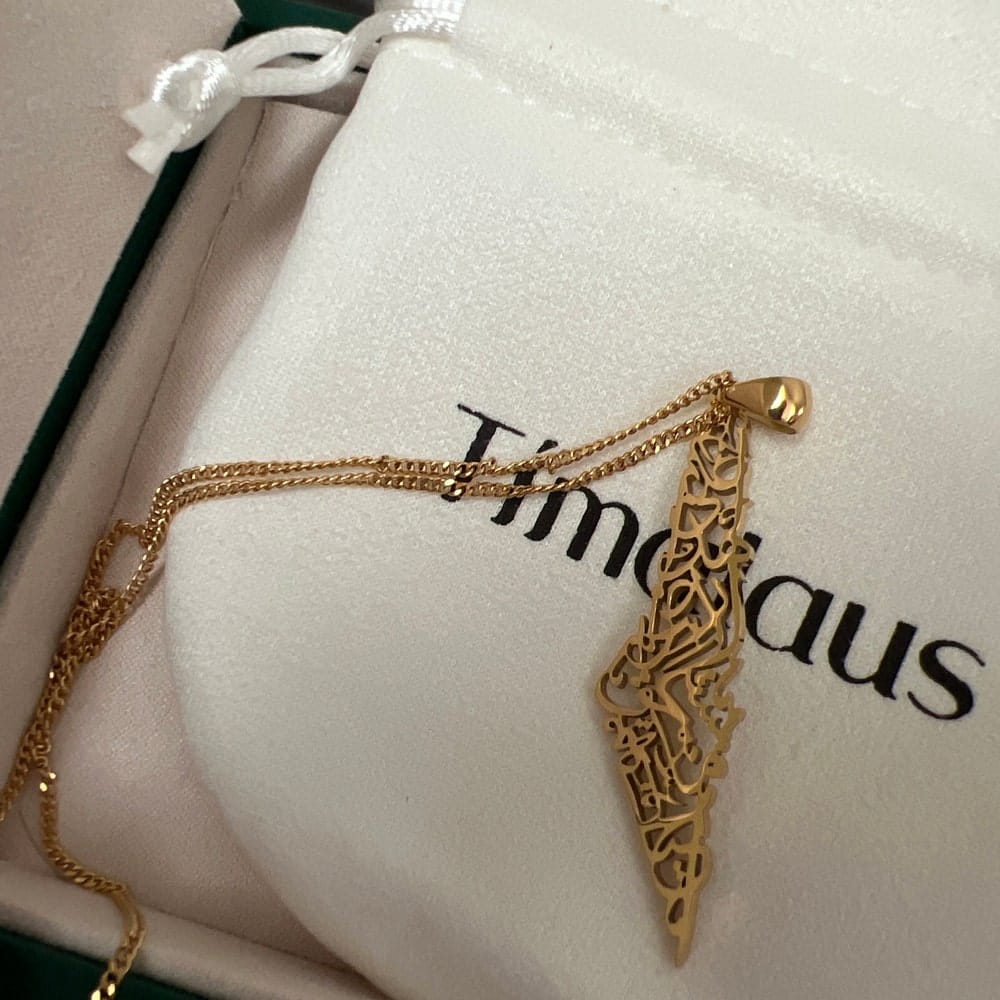 Customer photo review of Palestine Calligraphy Map Necklace