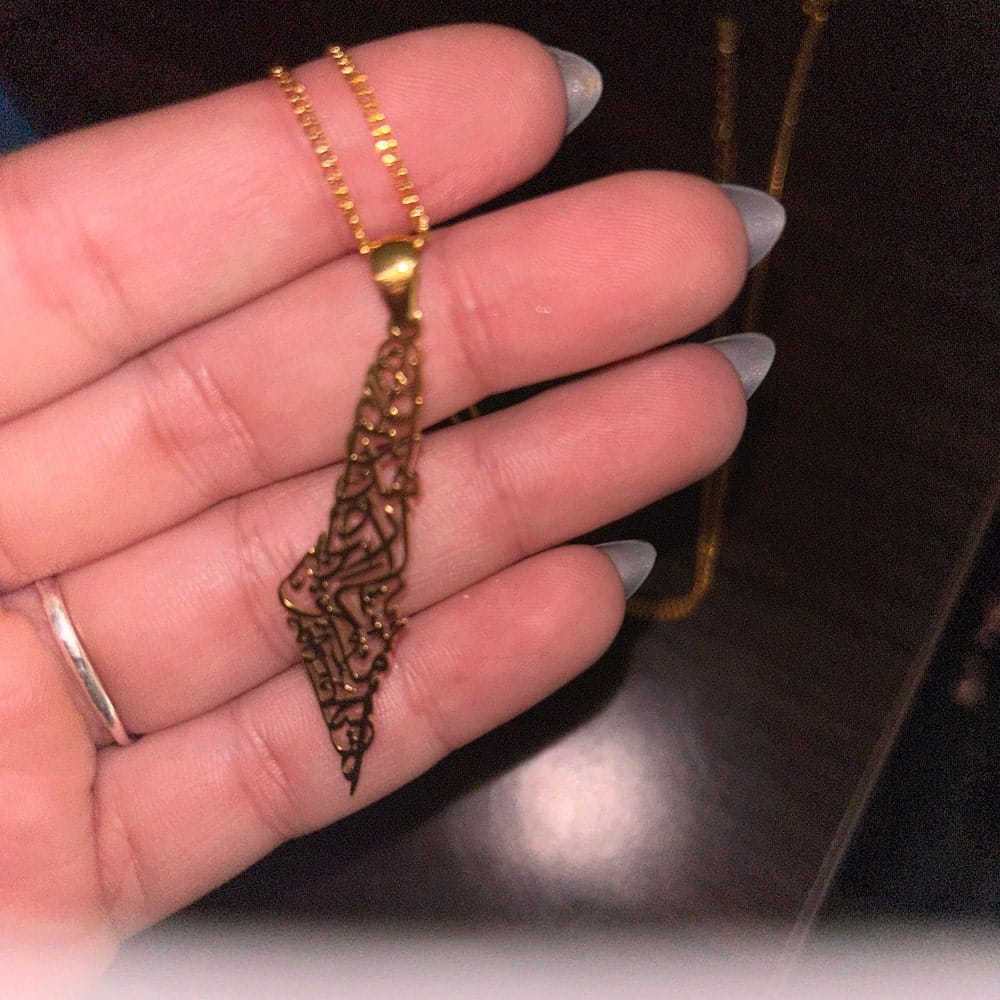 Customer photo review of Palestine Calligraphy Map Necklace