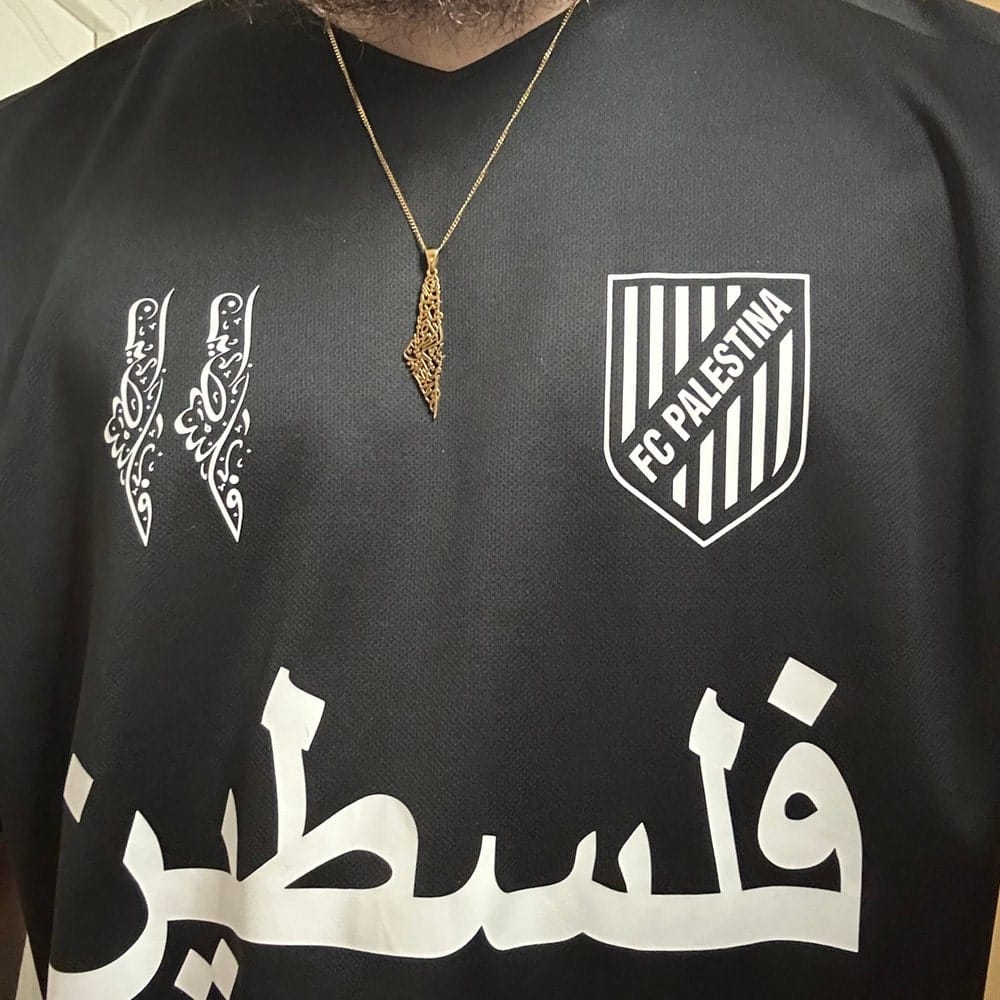 Customer photo review of Palestine Calligraphy Map Necklace