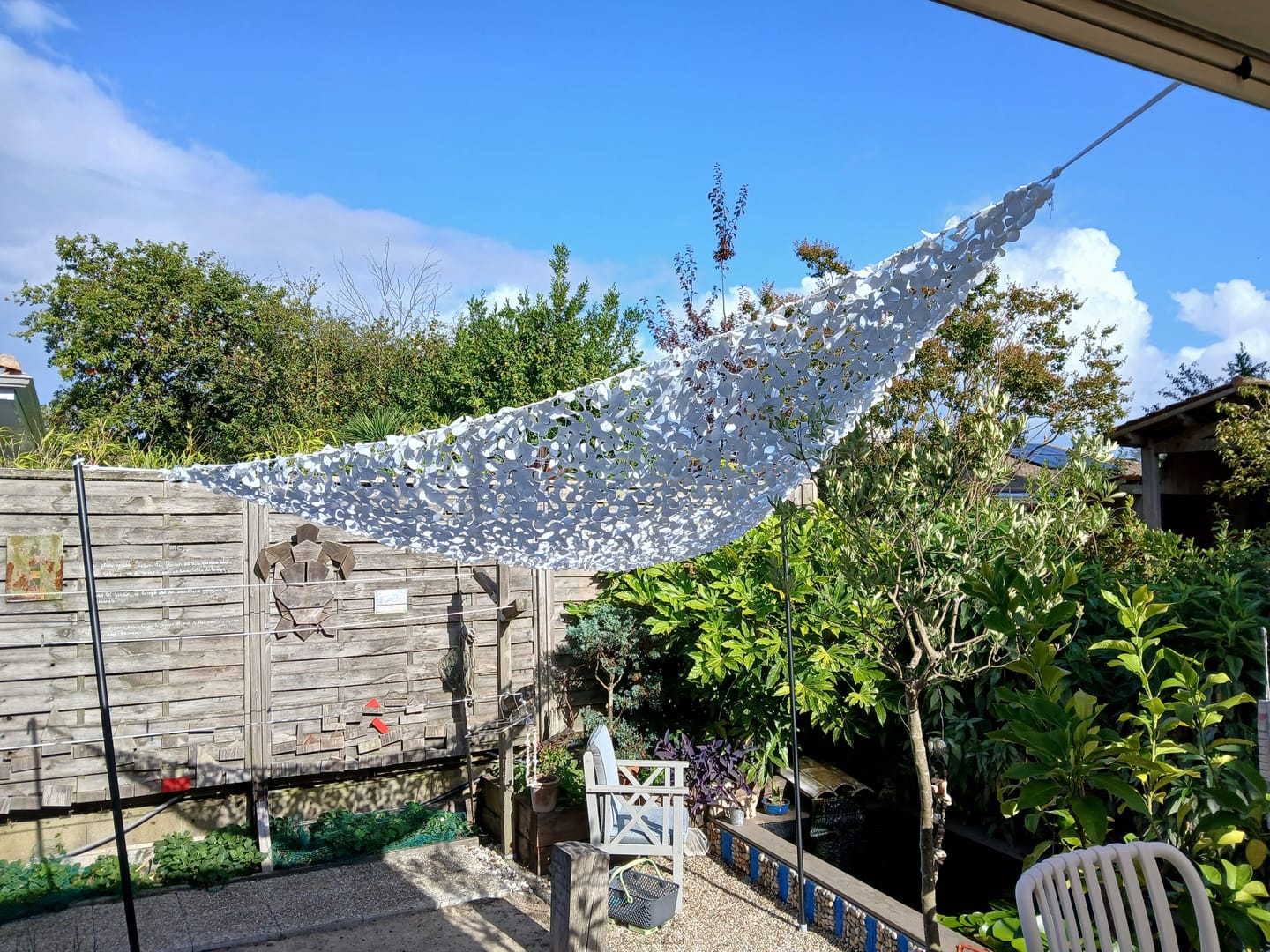 Customer photo review of Filet de camouflage triangulaire blanc